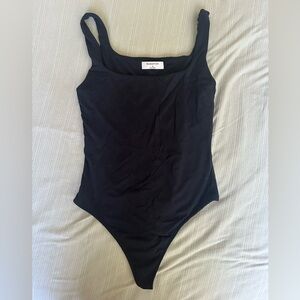 black square neck thong bodysuit from aritzia